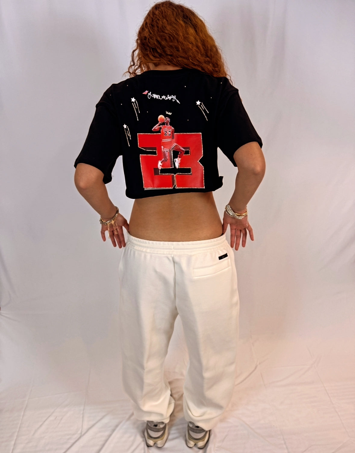 23 JORDAN - THE HISTORY OF FLIGHT CROP TOP T-SHIRT FOR WOMEN
