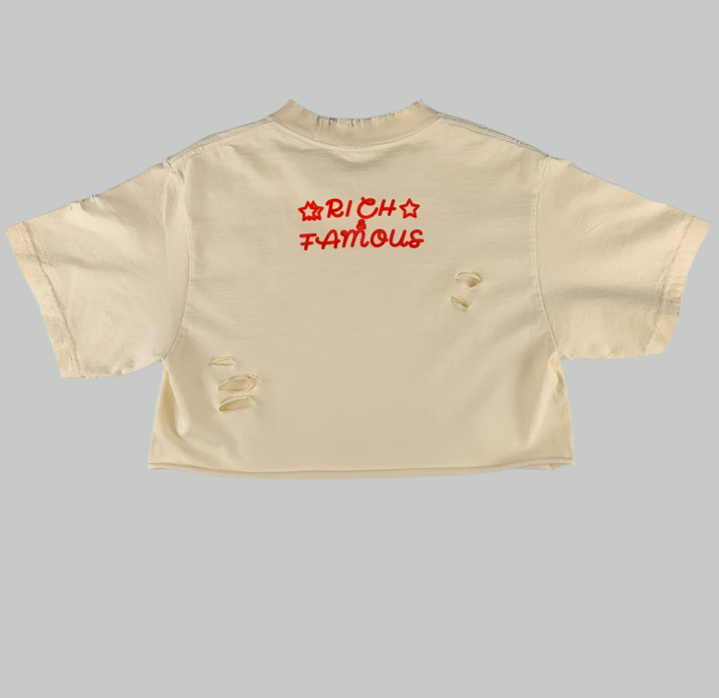 Hand crafted Rihana “Rich & Famous” Crop-Top for women with flower rhinestones.